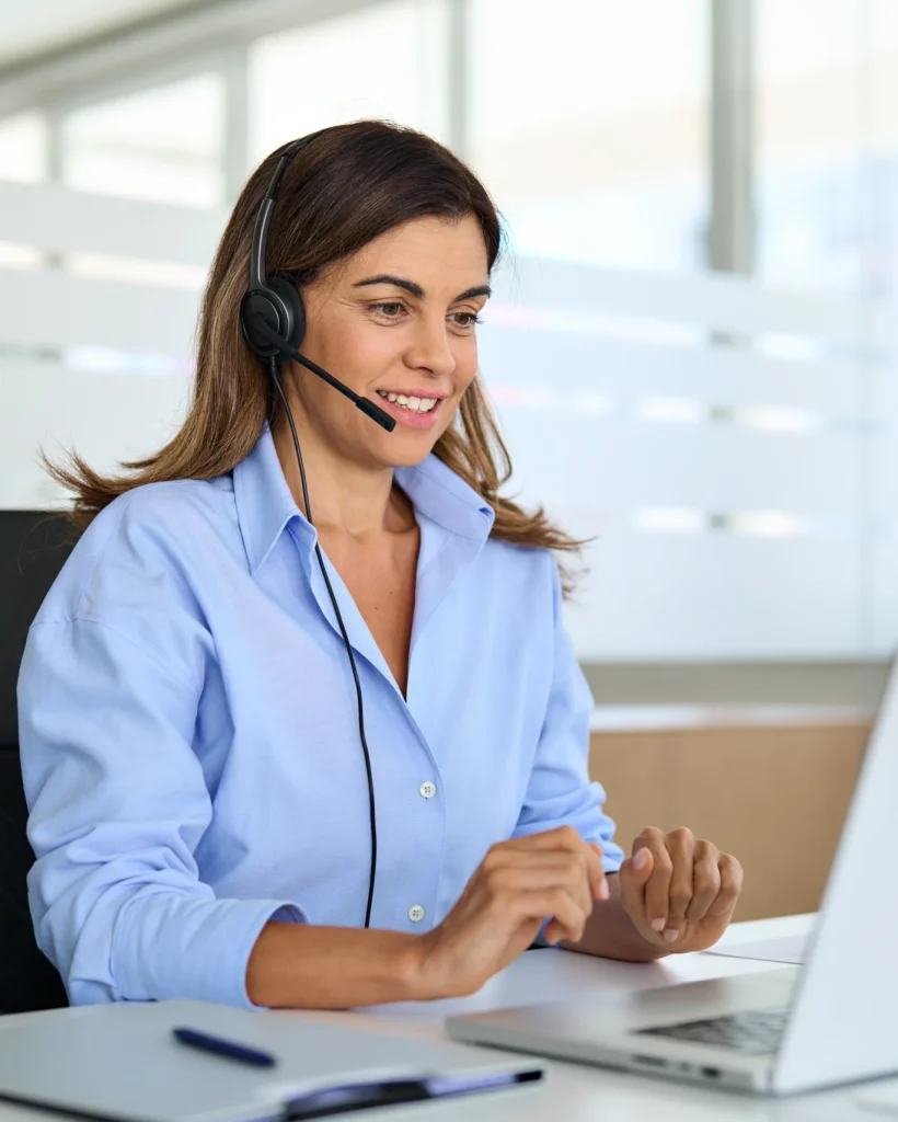 Woman At Desk On Conference Call